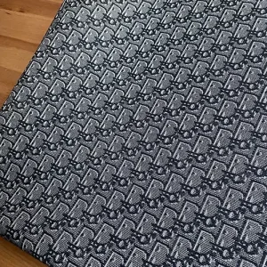 Dior Dark Gray Jacquard fabric with lighter contour lines on pattern!